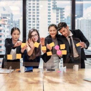 multi-ethnic-business-team-brainstorming-with-paste-color-post-it-note-board-office_49071-2664